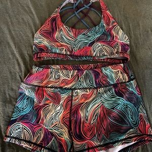Born primitive matching spandex shorts and sports bra